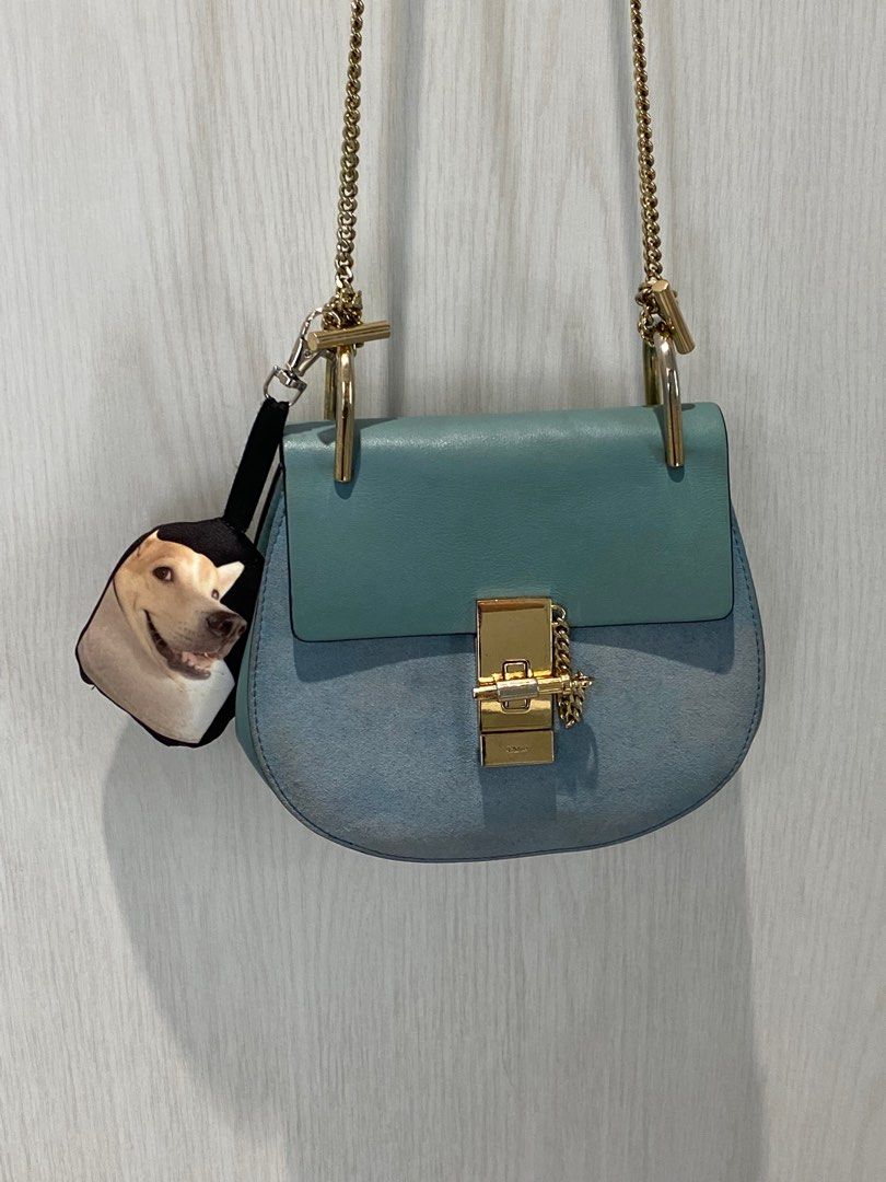 Chloe Drew Mini bag (Category: Luxury Bags & Wallets) located in Marikina City. Submitted by whostoledcookiefrmdcookiejar (Listing ID 1234145598, Image 1). Description: Guaranteed authentic. Used and still in good condition with normal signs of wear which is why I’m selling low. Comes with dustbag. Shade is Cloudy Blue. Suede needs cleaning or bag spa. Reservation: 2 days Payment: Gcash, BPI, or Unionbank transfer Shipping: same day delivery via 