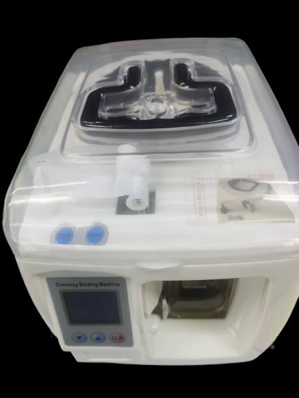 CURRENCY BINDING MACHINE (Category: Office & Business Technology) located in Manila. Submitted by laived (Listing ID 1234130811, Image 2). Description: Binding Machine is a fully-automated, quick binding machine. The machine binds using thermo-compression for a sleek and firm bind. The patented design of the adjustable binding position, internal thermostat and ironing head temperature are all automatically controlled, which ensures the machine is