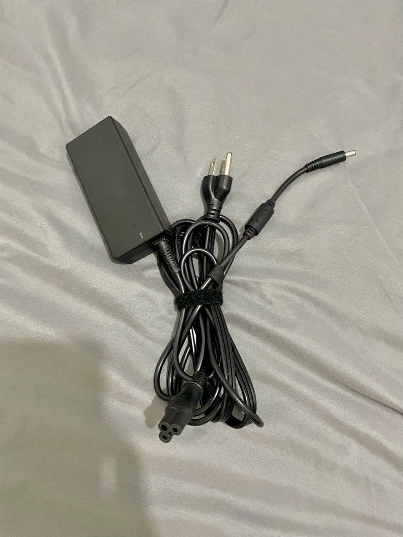 Dell 65w laptop charger Original (Category: Chargers) located in Taguig. Submitted by chellyx (Listing ID 1234088735, Image 1). Description: For sale Dell 65w original laptop charger Lightly used. Looks brand new. This charger is original. Came with the laptop RFS: spare. Not in use. Laptop was disposed already. Fixed price 700. No meetup. Deliver only.