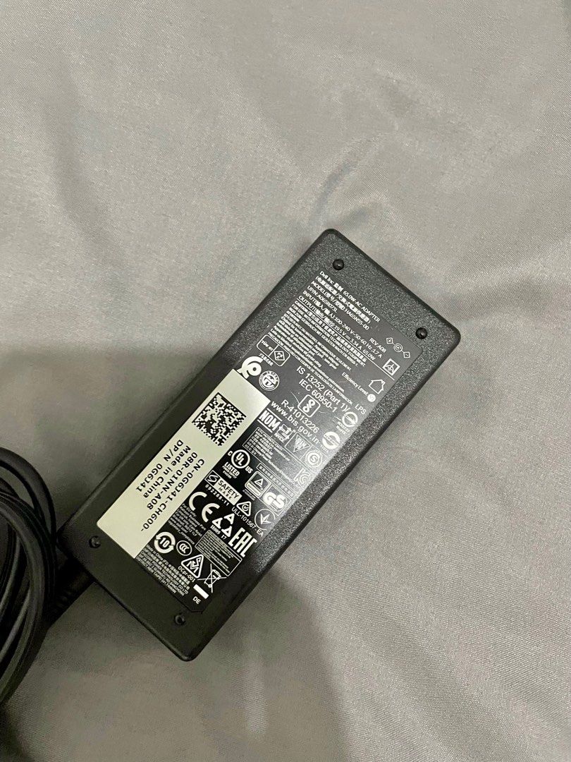 Dell 65w laptop charger Original (Category: Chargers) located in Taguig. Submitted by chellyx (Listing ID 1234088735, Image 2). Description: For sale Dell 65w original laptop charger Lightly used. Looks brand new. This charger is original. Came with the laptop RFS: spare. Not in use. Laptop was disposed already. Fixed price 700. No meetup. Deliver only.
