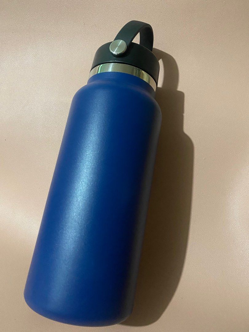 Hydro Flask 32 oz. (Cobalt 2.0 Wide Mouth) (Category: Water Bottles & Tumblers) located in Makati City. Submitted by aaaaagb (Listing ID 1234212464, Image 3). Description: Authentic. Bought from Official Store on Shopee. Seldom used. Flaws: See last photo, minimal ding and can be covered with boot. (Can give generic boot as freebie) RFS: Decluttering.