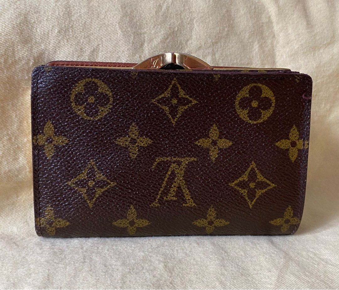 Louis Vuitton Frech Kisslock Monogram Bifold Wallet (Category: Luxury Bags & Wallets) located in Bulacan. Submitted by thedeclutteringmom (Listing ID 1234106312, Image 2). Description: Guaranteed original Money back if proven fake Vintage LV monogram kisslock bifold wallet In very good condition With very minimal signs of use Gold and working hardwares Painted the flakey part at the bill slot With tolerable flakey part near the card slot (pls see