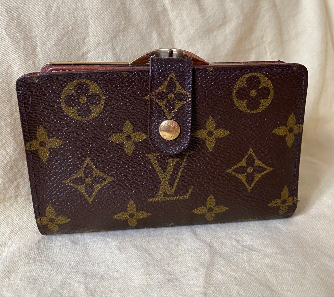 Louis Vuitton Frech Kisslock Monogram Bifold Wallet (Category: Luxury Bags & Wallets) located in Bulacan. Submitted by thedeclutteringmom (Listing ID 1234106312, Image 1). Description: Guaranteed original Money back if proven fake Vintage LV monogram kisslock bifold wallet In very good condition With very minimal signs of use Gold and working hardwares Painted the flakey part at the bill slot With tolerable flakey part near the card slot (pls see