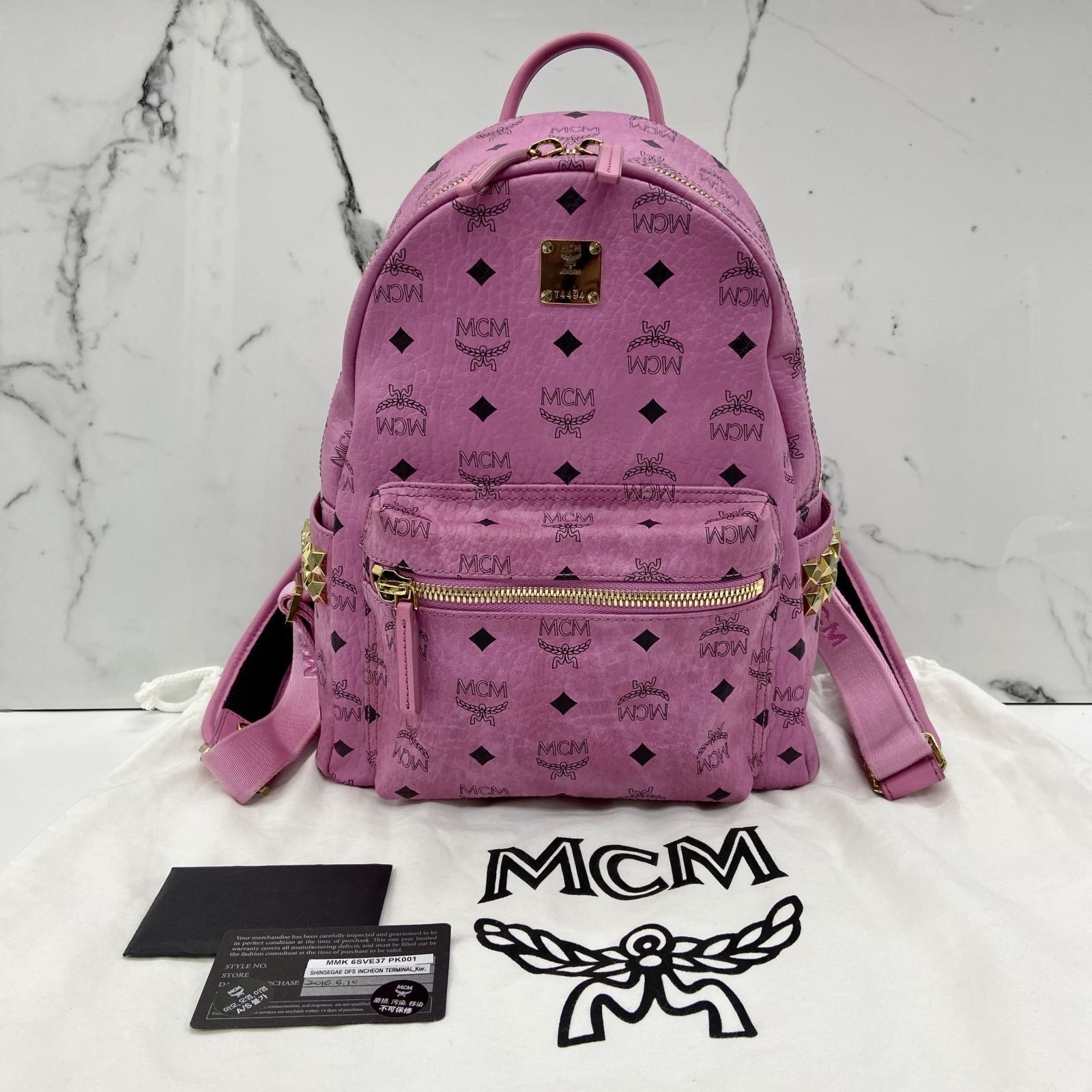 Mcm mini sales pink leather backpack