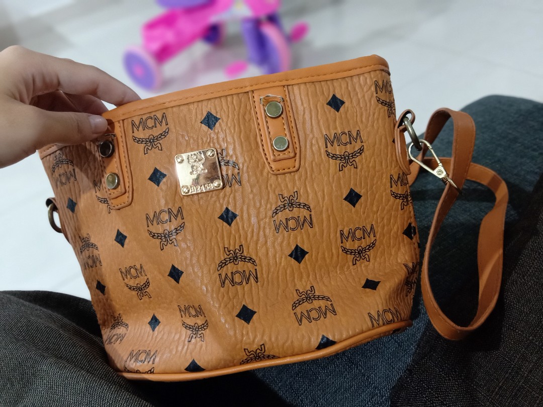 MCM MUNCHEN SLING BAG, Luxury, Bags & Wallets on Carousell