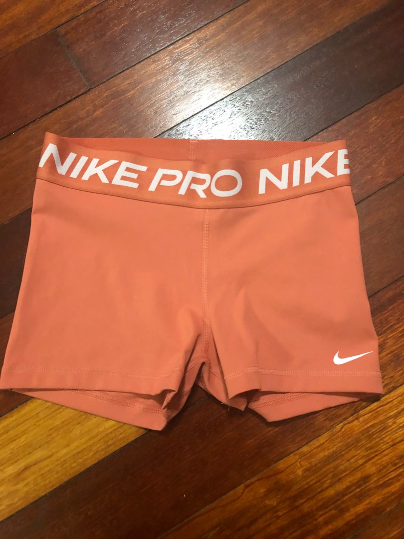 neon orange nike pros