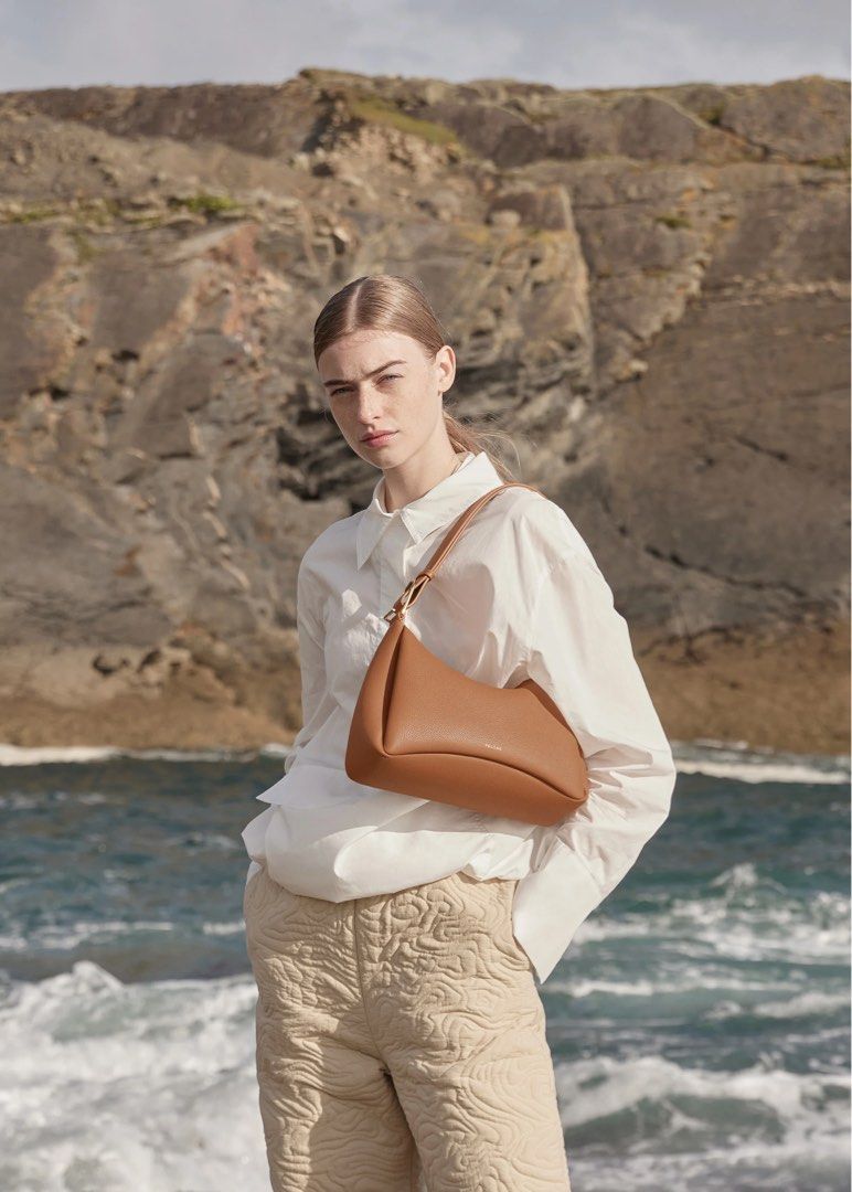 Polene Umi in Textured Camel (Category: Luxury Bags & Wallets) located in Quezon City. Submitted by Locker101 (Listing ID 1234233646, Image 3). Description: Authentic from Polene in Europe ETA:2-3 weeks ✅Open for layaway up to 6 months 10% DP required Dimensions: 30 x 19 x 11 cm. Weight: 570 g. Adjustable shoulder strap: 108 cm. Interior pocket. Zippered closure..