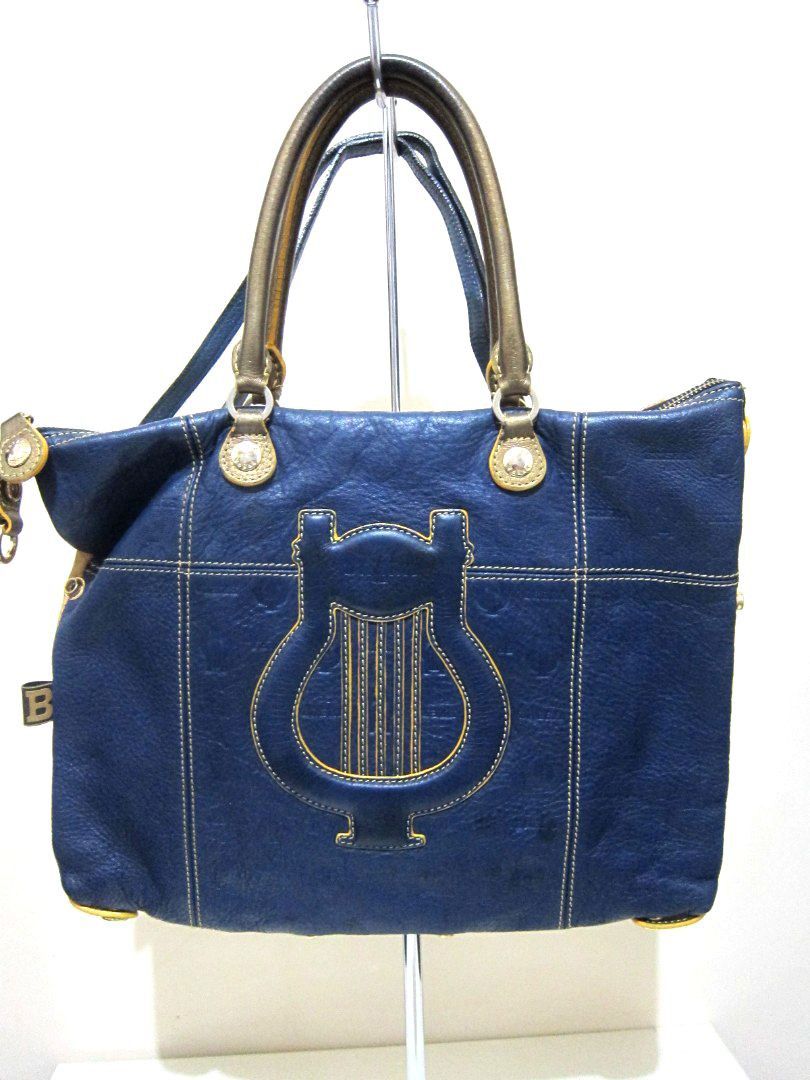 PreLoved BRERA Rare print two way bag (Category: Shoulder Bags) located in Quezon City. Submitted by help_ahoarder (Listing ID 1230567030, Image 1). Description: Soft leather and adjustable, a pretty mix of blue and yellow. This bag has a lot of imperfections on the leather that's why I'm selling it low but the overall effect of the bag is still stunning. 😊 🌺 LAST PRICE POSTED. Please don't offer if you're not sure if you're going to take it. I