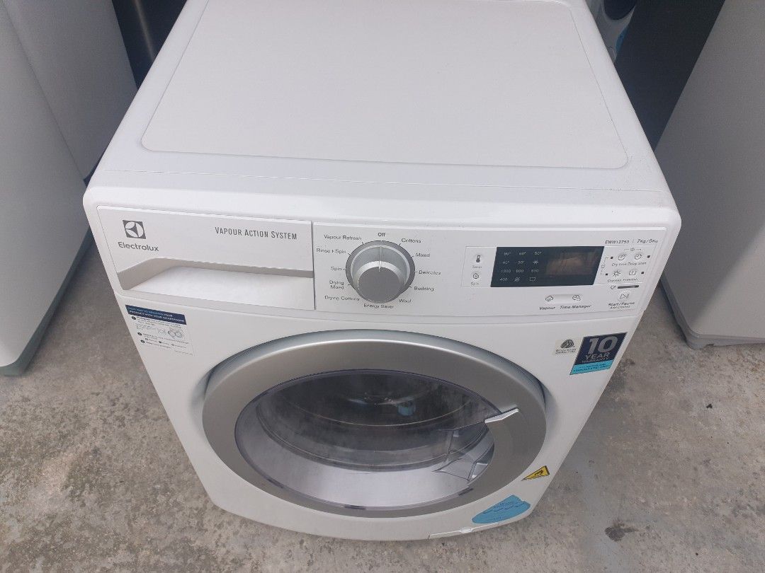 Used Electrolux 2in1 front load 7/5kg combo hot washer with dryer