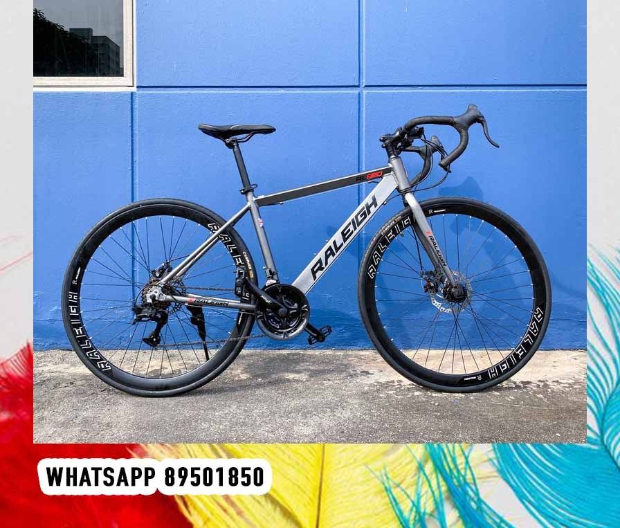 Raleigh hybrid bike rl880 sales