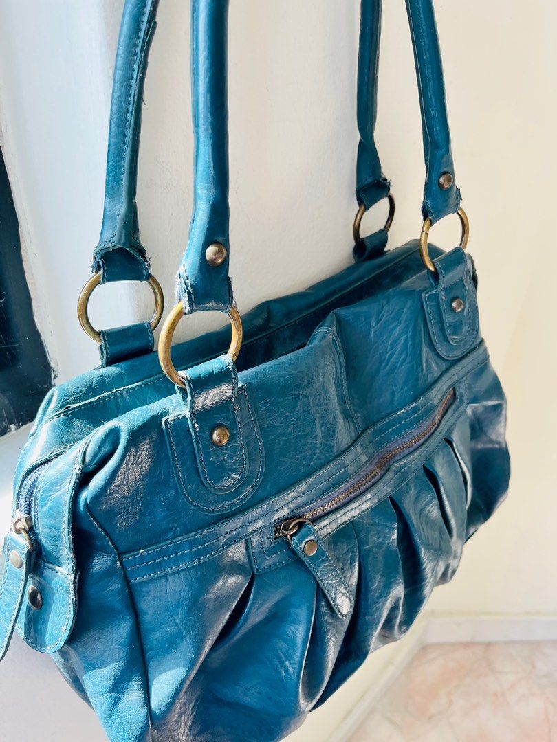 Accessorize blue bag shop