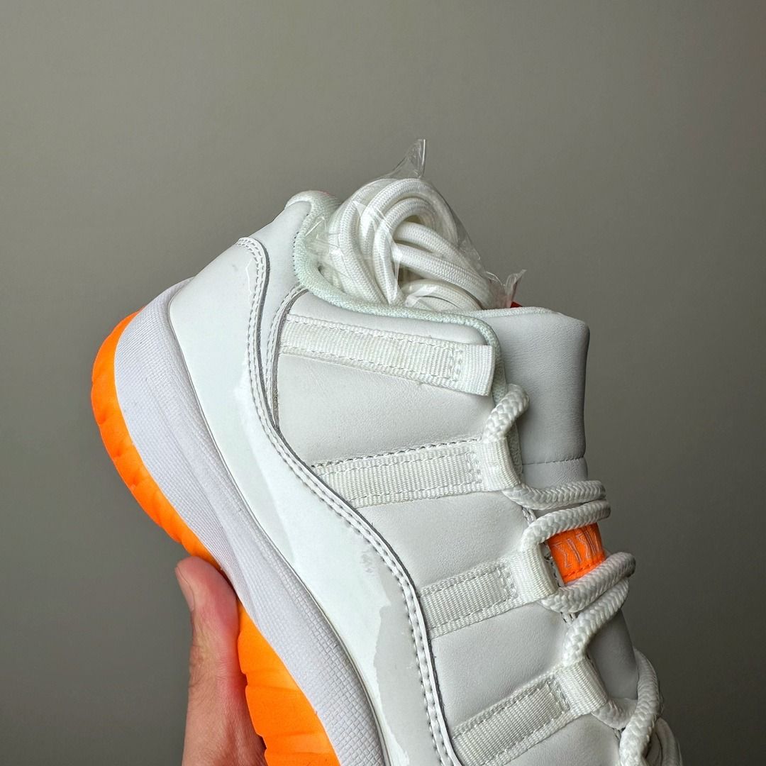 White orange sales jordan 11