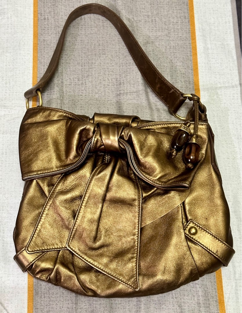 Authentic YSL metallic bronze sac bow bag, Luxury, Bags & Wallets on