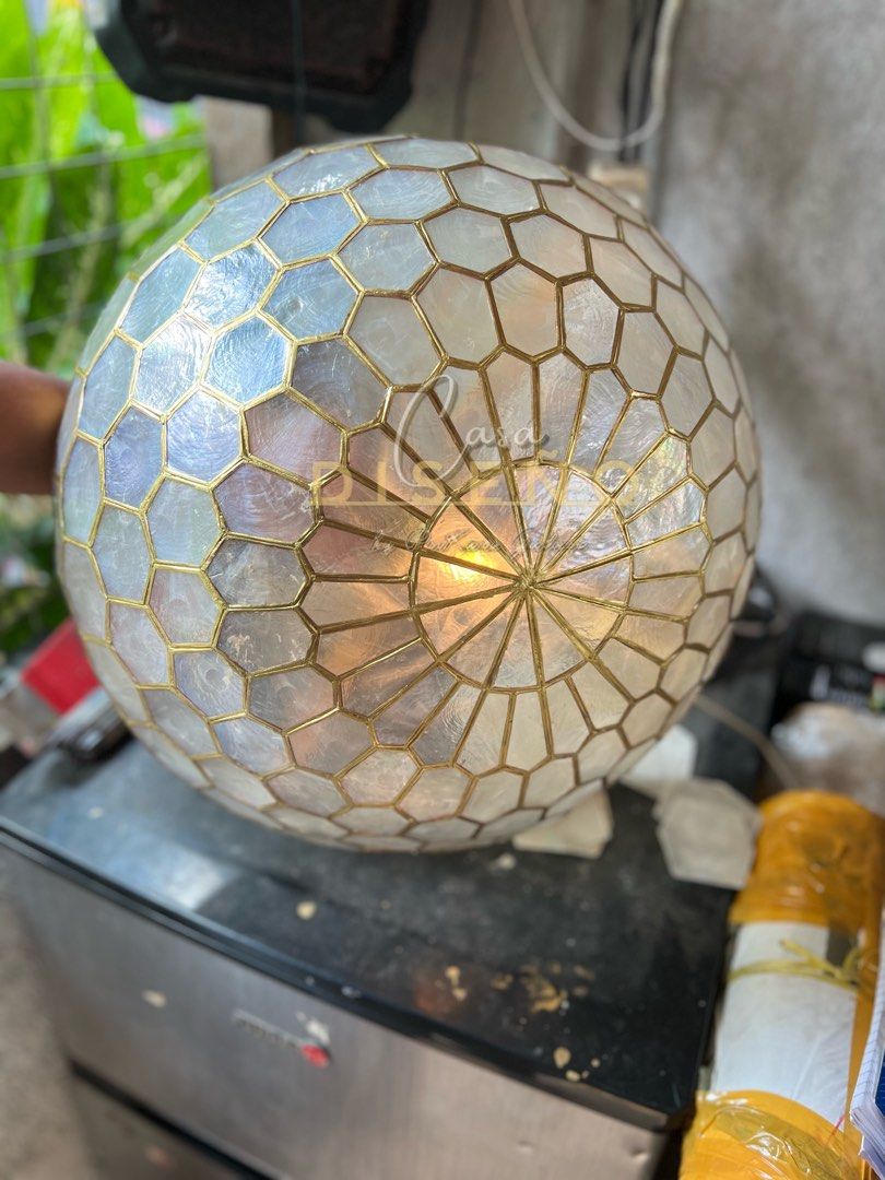 Capiz ceiling lamp (Category: Lighting) located in Caloocan City. Submitted by casadisenyo (Listing ID 1234401640, Image 3). Description: MADE TO ORDER CAPIZ CEILING LAMP Size: 16.5" Lead time: 10-15days after downpayment confirmation We co customized other capiz designs.