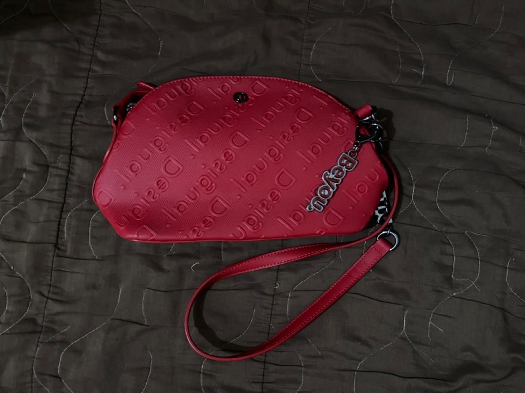 Desigual Beyou Sling bag lettering strip (Category: Shoulder Bags) located in Makati City. Submitted by expressdrive (Listing ID 1234348331, Image 2). Description: NO TO LOWBALLERS. Good as new. Used twice..