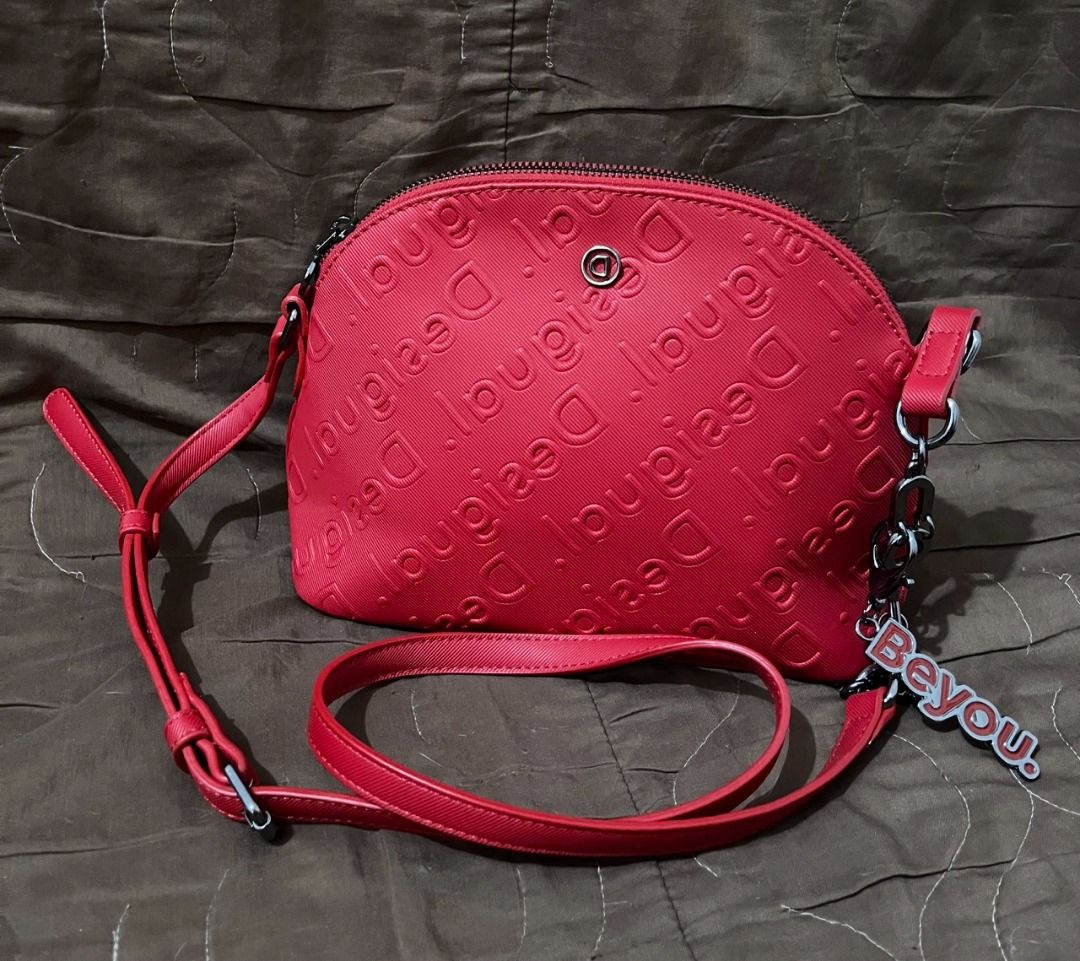 Desigual Beyou Sling bag lettering strip (Category: Shoulder Bags) located in Makati City. Submitted by expressdrive (Listing ID 1234348331, Image 1). Description: NO TO LOWBALLERS. Good as new. Used twice..
