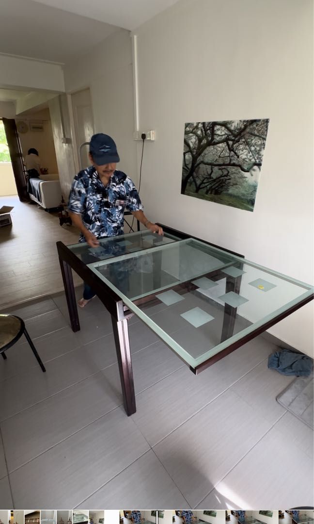 Dining table extendable (Category: Tables & Sets) located in Singapore. Submitted by cenedra42 (Listing ID 1234254283, Image 3). Description: Glass n solid wood dining table (no chairs ) Easily extendable . 90cm x 90 cm x 78 cm height Very Functional for parties simple elegant design .