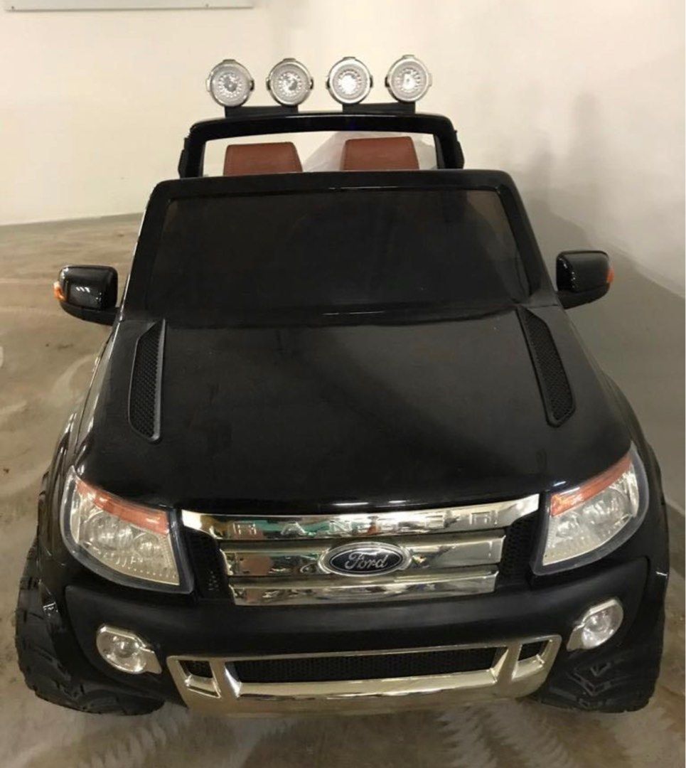 Ford Ranger Toy remote control car (Category: Remote Control Toys) located in Las Pinas. Submitted by chief18 (Listing ID 1234434804, Image 1). Description: Selling because not in use anymore. Comes with starter key & charger. No more remote control. Can nego..