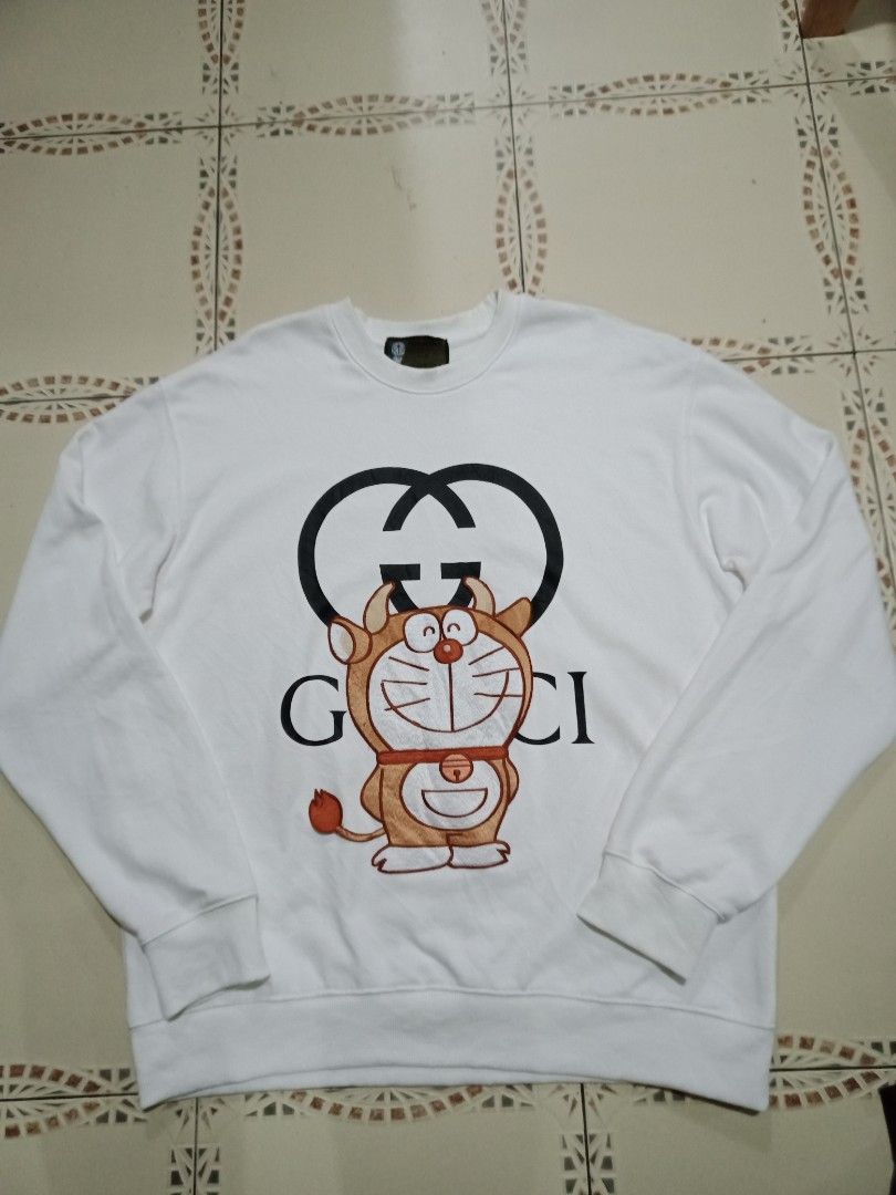 Gucci x Doraemon sweater, Men's Fashion, Tops u0026 Sets, Hoodies on Carousell