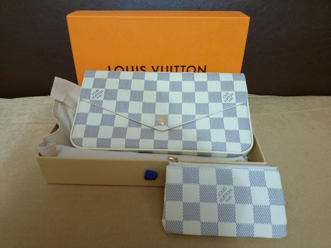 LV Felicie Sling Wallet (Category: Luxury Bags & Wallets) located in Amadeo. Submitted by lovedbyleslee (Listing ID 1234339476, Image 2). Description: BRAND NEW LV Felicie Sling Wallet Color: White Azure with FREE LV Cles Coin Purse ☺️ Reason for Selling: Decluttering, bought this for Php 2799.