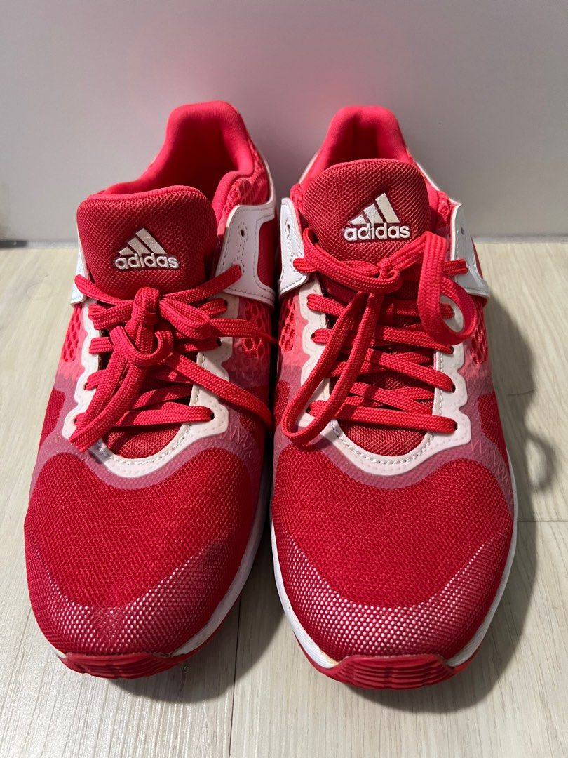 Neon pink adidas store