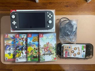 Nintendo Switch Lite (with games and case included)