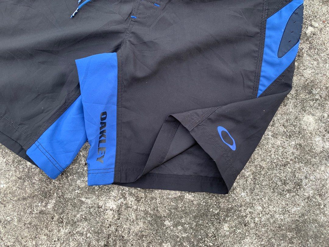 Oakley Board Shorts, Men's Fashion, Bottoms, Shorts on Carousell