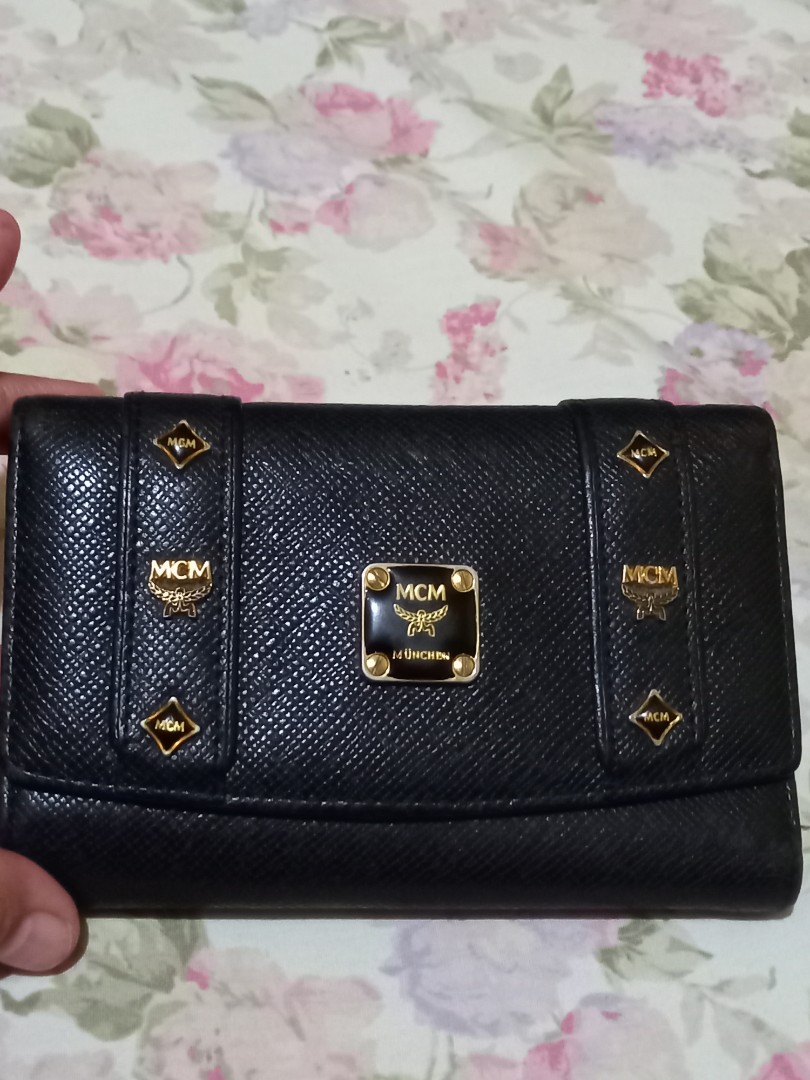 Preloved MCM trifold wallet Original on Carousell
