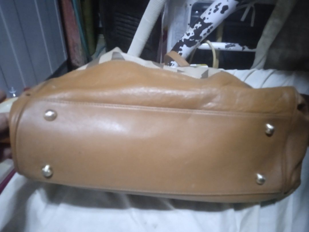 Preloved Original Louis Quatorze Bag (Category: Luxury Bags & Wallets) located in Mandaluyong City. Submitted by vinciel_545 (Listing ID 1234344834, Image 3). Description: Authentic Louis Quatorze Bag large size.Genuine leather and canvass materials. no sling included .No major flaws .Snap not so magnetic. Price Negotiable for sure buyer only .