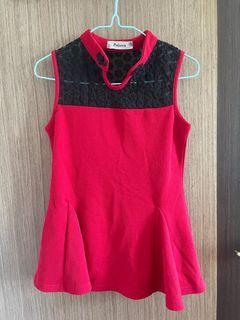 Red Sleeveless Top with Black Flower Patterns