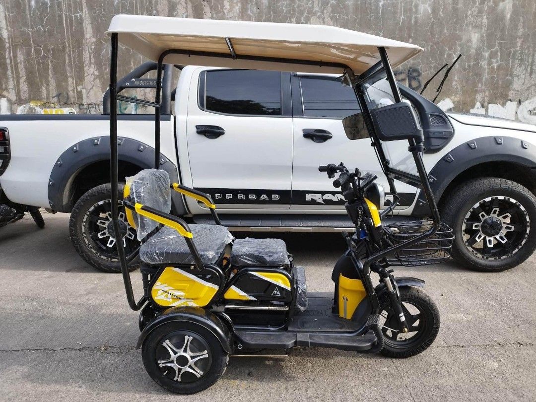 URANUS MINI 3 WHEELS E-TRIKE WITH ROOF & WINDSHIELD (Category: Bicycles) located in Pasig City. Submitted by gemma_00 (Listing ID 1234439553, Image 2). Description: RESTOCKED 😱😱 PNAKA MURANG ETRIKE, LUMAPAG NAAAA 🥰 URANUS MINI 3 WHEELS E-TRIKE WITH ROOF & WINDSHIELD ❗₱27,999 SALE PRICE🔊 👉🏻FREE TRAPAL / RAIN CURTAIN 📌Specs ✔️WITH AUTOMATIC WIPER ✔️WITH ROOF & WINDSHIELD ✔️WITH SIDEMIRROR ✔️TIRE SIZE 10X3.0 ✔️WITH REAR BASKET ✔️3 SEATER WITH