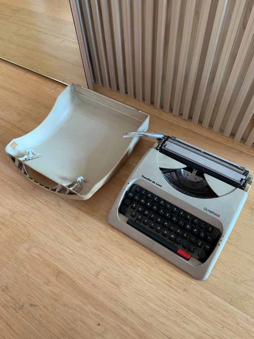 Vintage Typewriter Traveller de luxe Olympia (Category: Printers, Scanners & Copiers) located in Quezon City. Submitted by garagesalehomecafe (Listing ID 1234317984, Image 2). Description: Traveller de luxe Olympia Typewriter with cover and complete parts.