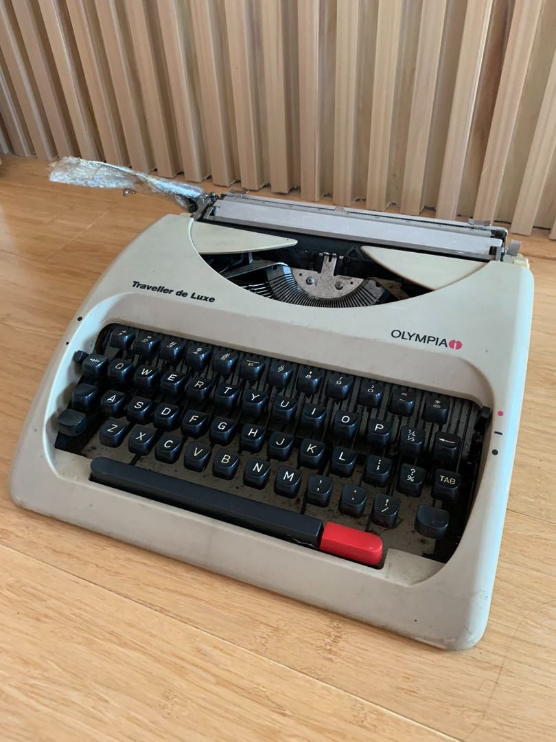 Vintage Typewriter Traveller de luxe Olympia (Category: Printers, Scanners & Copiers) located in Quezon City. Submitted by garagesalehomecafe (Listing ID 1234317984, Image 1). Description: Traveller de luxe Olympia Typewriter with cover and complete parts.