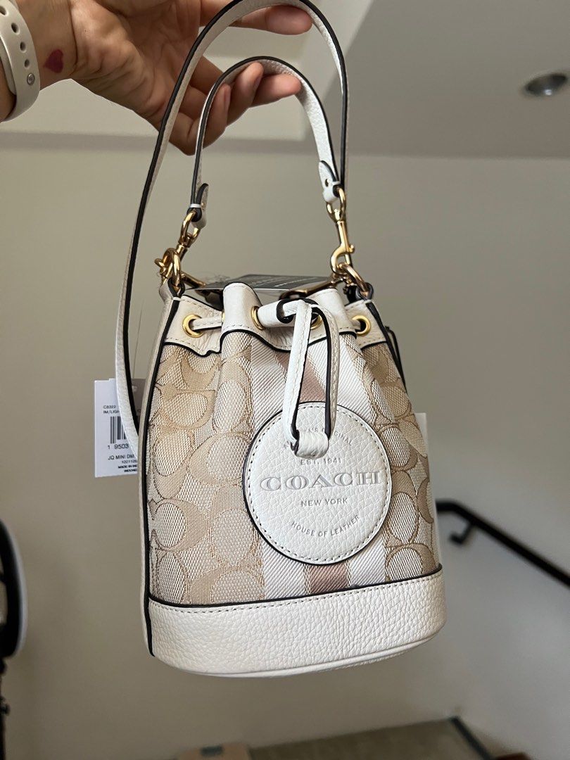 Authentic Coach Mini Dempsey Bag (Category: Luxury Bags & Wallets) located in Paranaque City. Submitted by vanillameow (Listing ID 1234462537, Image 2). Description: Authentic! Bought from Zalora app. Already out of stock. Original Price 35,000. Selling for 18k Only! With zalora receipt..