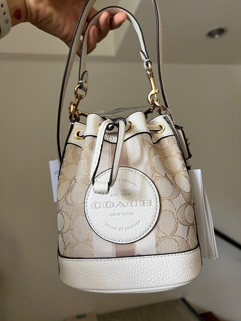 Authentic Coach Mini Dempsey Bag (Category: Luxury Bags & Wallets) located in Paranaque City. Submitted by vanillameow (Listing ID 1234462537, Image 1). Description: Authentic! Bought from Zalora app. Already out of stock. Original Price 35,000. Selling for 18k Only! With zalora receipt..