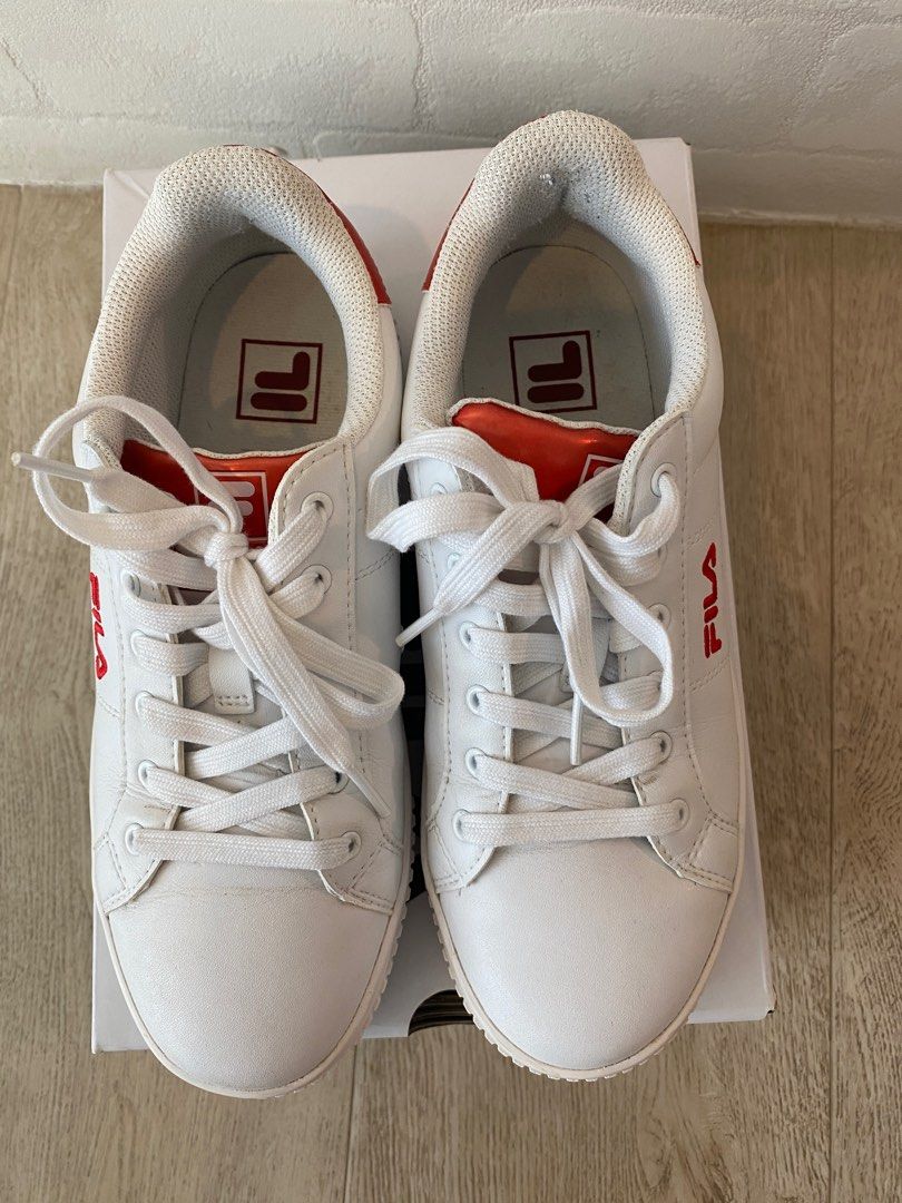 Shiny fila trainers top