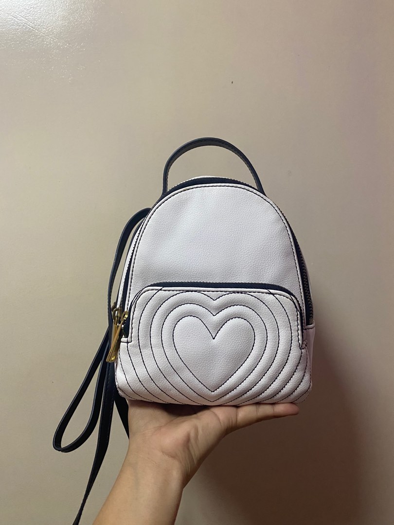 Fossil mini sling/backpack on Carousell