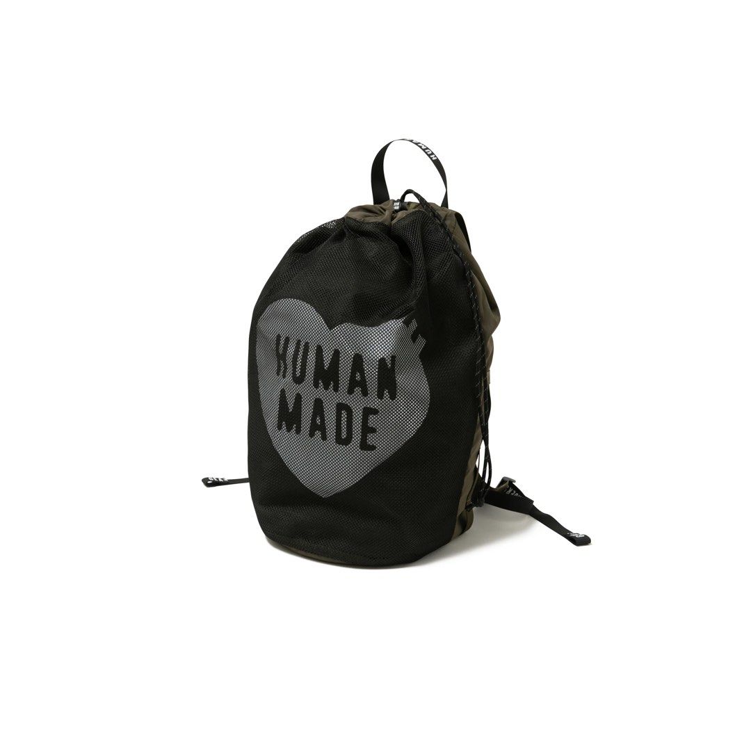HUMAN MADE DRAWSTRING BACKPACK (Category: Backpacks) located in Singapore. Submitted by nichloesg (Listing ID 1234595499, Image 5). Description: ✅ Olivedrab Height 45, width 23, depth 20cm Find us at @nichloesg Tags Nigo .