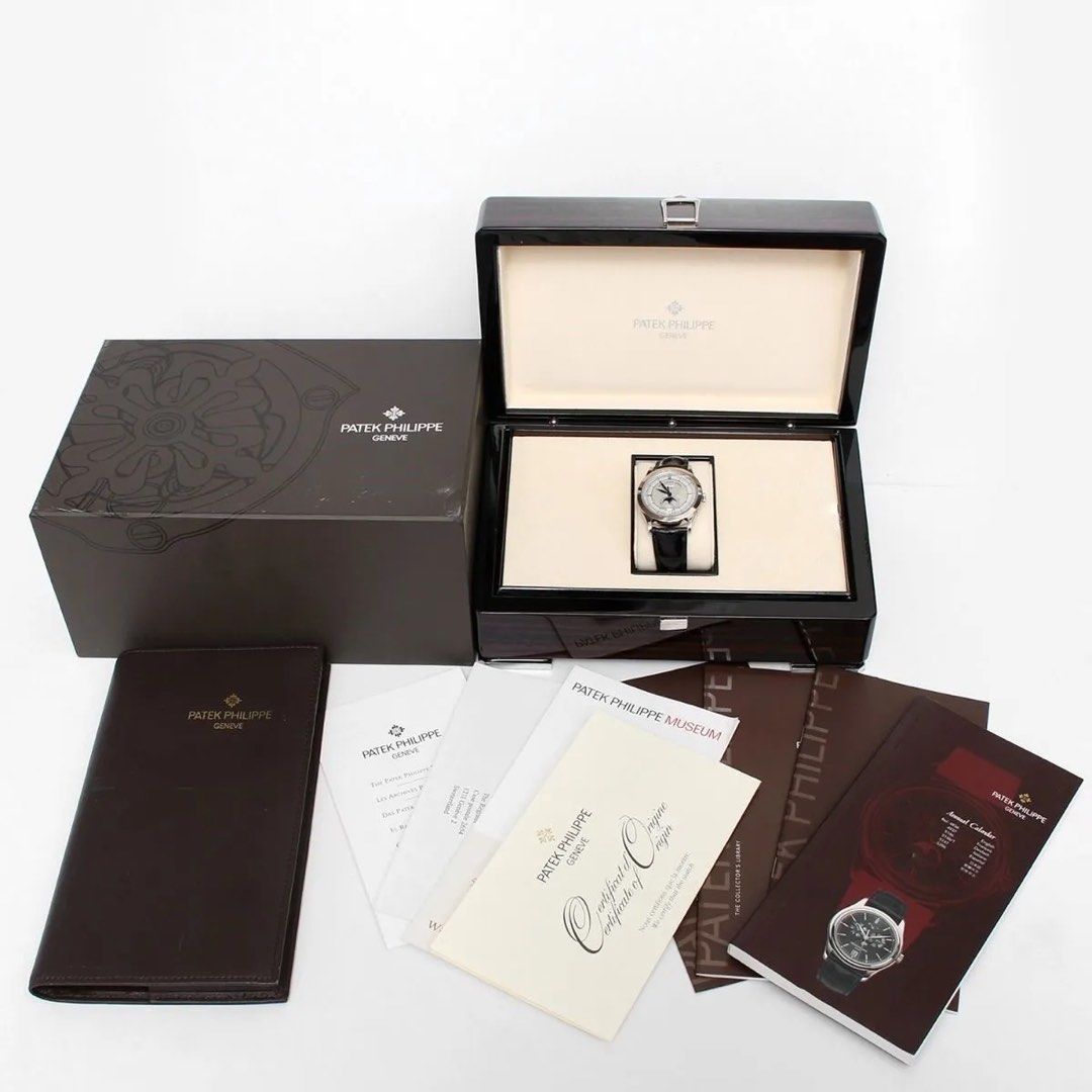 Patek Philippe 5396G-001 Annual Calendar Moonphase Two Tone Sector Dial 38.5mm (Category: Watches) located in Singapore. Submitted by ahlinggg (Listing ID 1234560571, Image 3). Description: Patek Philippe from my personal collection. 2 years warranty from Patek Philippe left on the watch. IMO, one of the most beautiful of the modern Pateks, this reference 5396 was introduced in 2006. FUN FACT The design of the 001 two-tone sector dial is inspired