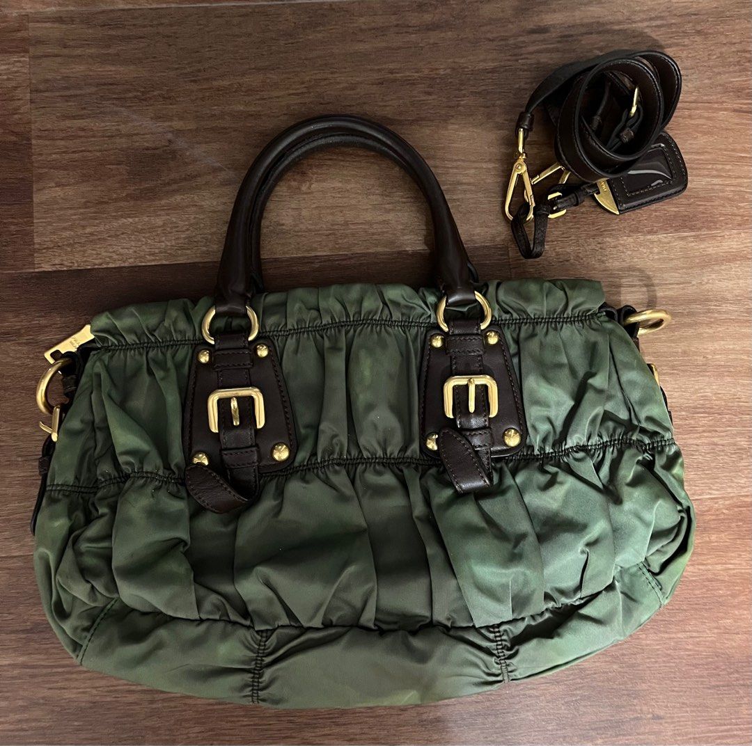 Preowned Prada Tessuto Gaufre Shoulder bag (Category: Bags & Wallets) located in Singapore. Submitted by kvril (Listing ID 1234588558, Image 2). Description: Letting go a under used Prada Tessuto Gaufre shoulder bag. Bag is still in good condition. Item comes with bag, shoulder strap, dust bag, authentic bag and receipt. Bag can be hand carry, sling or cross body. Please do not low ball and will not respond to low baller. Deal at seller’s conveni