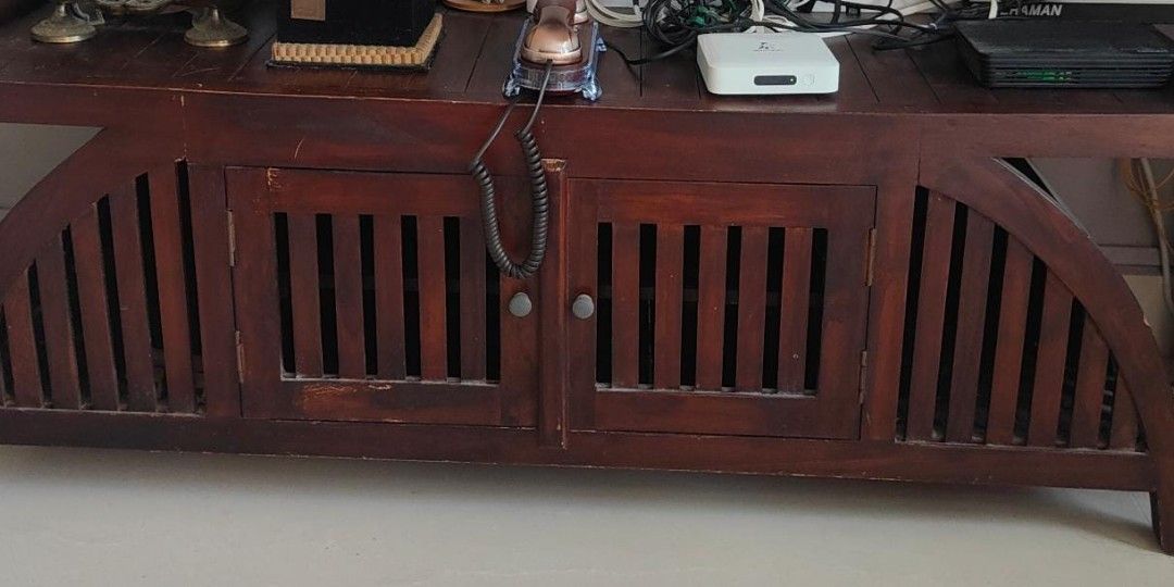 Solid wood table (Category: Other Home Furniture) located in Singapore. Submitted by baisham (Listing ID 1234523185, Image 1). Description: solid wood table can be used as a coffee table or TV console. Measurement on photos. Cleaned and maintained but natural wear and tear can be seen. can be vanished if you want. self collect at 530615..