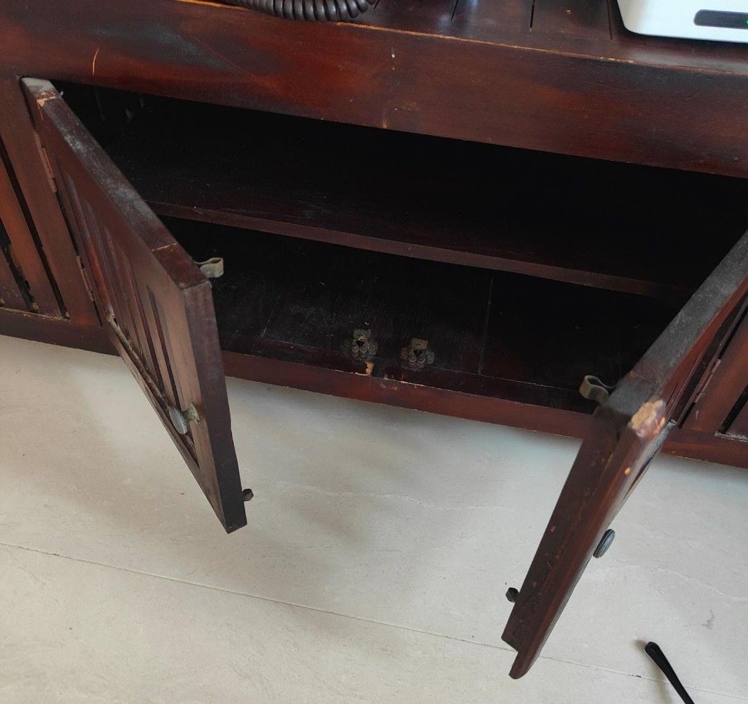 Solid wood table (Category: Other Home Furniture) located in Singapore. Submitted by baisham (Listing ID 1234523185, Image 3). Description: solid wood table can be used as a coffee table or TV console. Measurement on photos. Cleaned and maintained but natural wear and tear can be seen. can be vanished if you want. self collect at 530615..