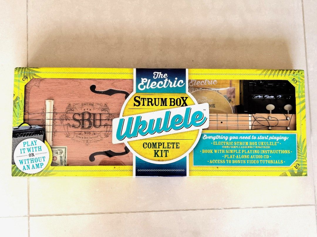 Electric strum discount box ukulele