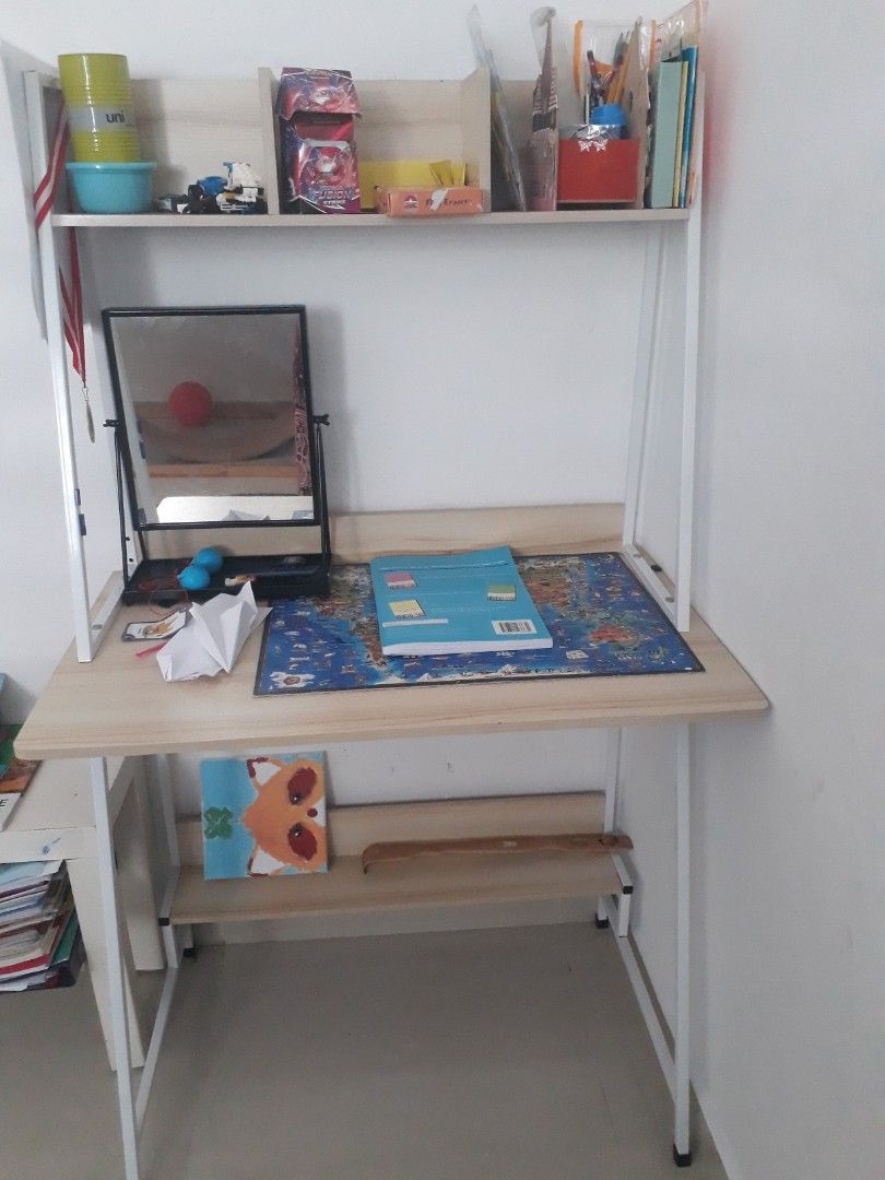 Study table (Category: Tables & Sets) located in Singapore. Submitted by Expruss (Listing ID 1234468835, Image 1). Description: Lightly used study table. In very good condition. Selling because my child prefer to study on the dining table. L 80cm B 48cm H140cm Pick up at 560122. not for fussy.