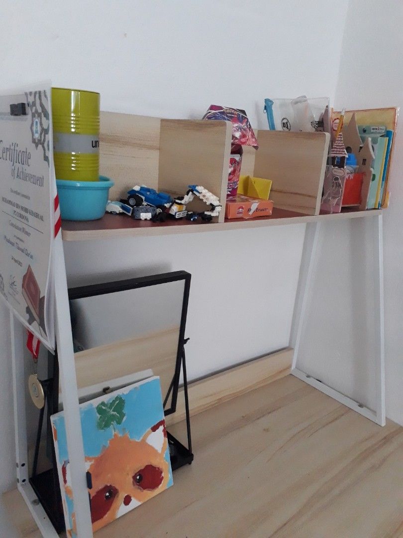 Study table (Category: Tables & Sets) located in Singapore. Submitted by Expruss (Listing ID 1234468835, Image 3). Description: Lightly used study table. In very good condition. Selling because my child prefer to study on the dining table. L 80cm B 48cm H140cm Pick up at 560122. not for fussy.
