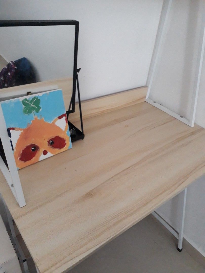 Study table (Category: Tables & Sets) located in Singapore. Submitted by Expruss (Listing ID 1234468835, Image 2). Description: Lightly used study table. In very good condition. Selling because my child prefer to study on the dining table. L 80cm B 48cm H140cm Pick up at 560122. not for fussy.