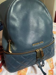 Michael Kors Rhea Zip Backpack, Luxury, Bags & Wallets on Carousell