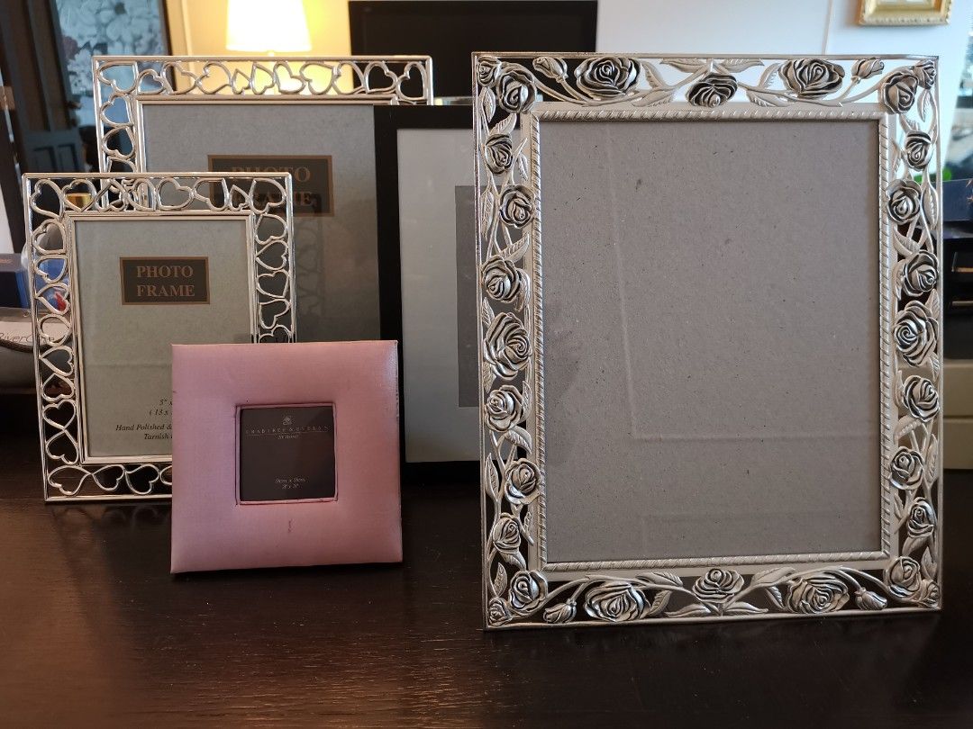Assorted picture frames (Category: Frames & Pictures) located in Singapore. Submitted by eochow (Listing ID 1229902063, Image 1). Description: bundle 4 frames. great gift idea..