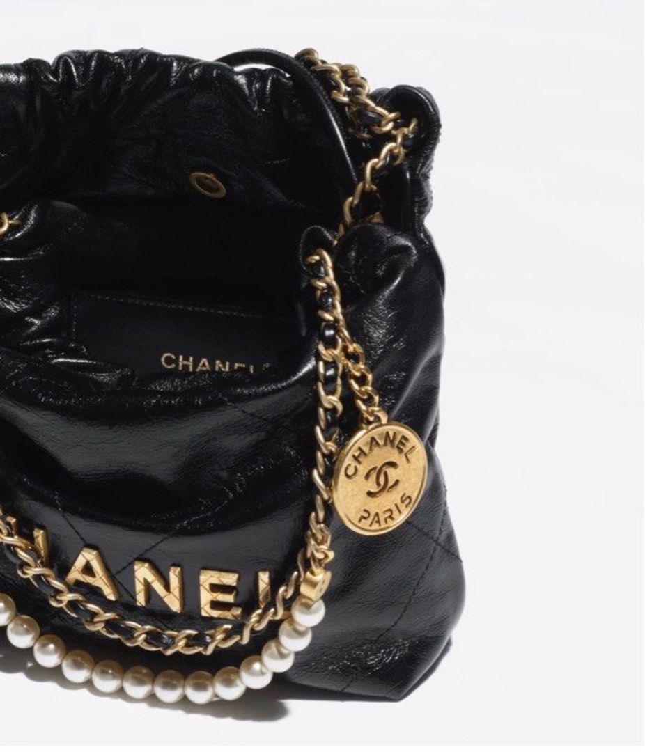 Chanel 23P Black 20cm Mini Flap Bag with adjustable heart chain