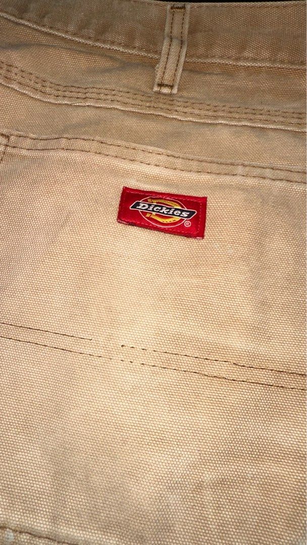 DICKIES CARPENTER PANTS BEIGE (Category: Trousers) located in Las Pinas. Submitted by vintcondition (Listing ID 1229967138, Image 3). Description: DICKIES BEIGE CARPENTER PANTS - Nice faded wash - 33x32 on tag ISSUES: - Paint splatters all over - Signs of wear (loose stitching on back pockets, minor scratches).